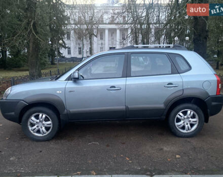 Зеленый Хендай Туксон, объемом двигателя 2 л и пробегом 223 тыс. км за 7950 $, фото 7 на Automoto.ua