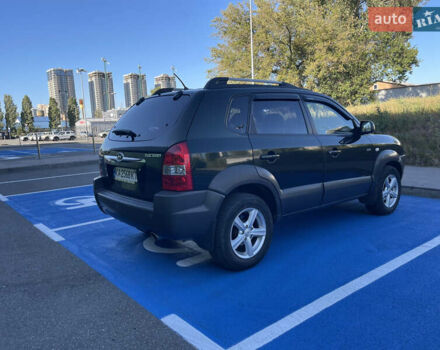 Зеленый Хендай Туксон, объемом двигателя 1.98 л и пробегом 195 тыс. км за 8000 $, фото 2 на Automoto.ua