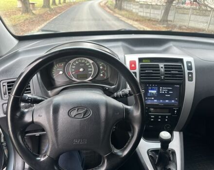 Зеленый Хендай Туксон, объемом двигателя 2 л и пробегом 190 тыс. км за 6150 $, фото 9 на Automoto.ua
