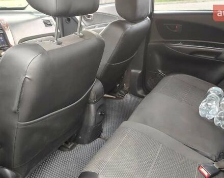 Зелений Хендай Туксон, об'ємом двигуна 1.98 л та пробігом 245 тис. км за 7800 $, фото 24 на Automoto.ua