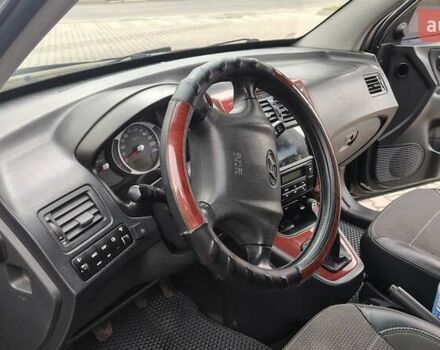 Зелений Хендай Туксон, об'ємом двигуна 1.98 л та пробігом 245 тис. км за 7800 $, фото 29 на Automoto.ua