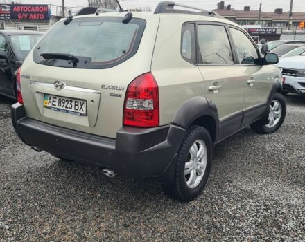 Зелений Хендай Туксон, об'ємом двигуна 2 л та пробігом 149 тис. км за 9900 $, фото 1 на Automoto.ua