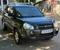 Зеленый Хендай Туксон, объемом двигателя 1.98 л и пробегом 185 тыс. км за 8199 $, фото 1 на Automoto.ua