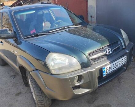 Зелений Хендай Туксон, об'ємом двигуна 1.98 л та пробігом 189 тис. км за 8500 $, фото 4 на Automoto.ua