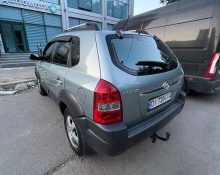 Зеленый Хендай Туксон, объемом двигателя 1.98 л и пробегом 205 тыс. км за 7700 $, фото 6 на Automoto.ua