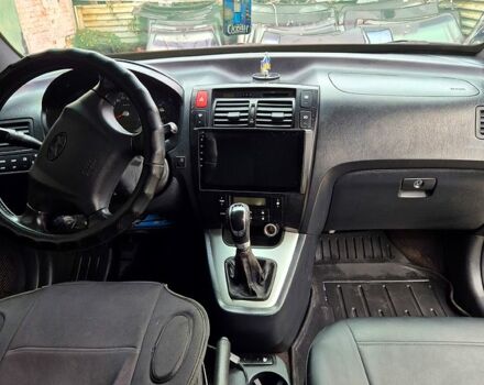 Зелений Хендай Туксон, об'ємом двигуна 2 л та пробігом 276 тис. км за 9000 $, фото 7 на Automoto.ua