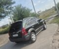 Зеленый Хендай Туксон, объемом двигателя 2 л и пробегом 213 тыс. км за 7800 $, фото 4 на Automoto.ua