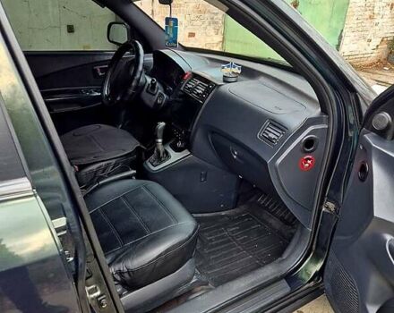 Зелений Хендай Туксон, об'ємом двигуна 2 л та пробігом 276 тис. км за 9000 $, фото 2 на Automoto.ua