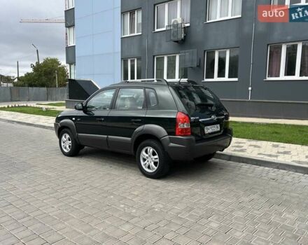 Зеленый Хендай Туксон, объемом двигателя 2 л и пробегом 82 тыс. км за 9950 $, фото 7 на Automoto.ua