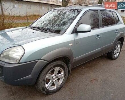 Зелений Хендай Туксон, об'ємом двигуна 1.99 л та пробігом 218 тис. км за 6500 $, фото 7 на Automoto.ua