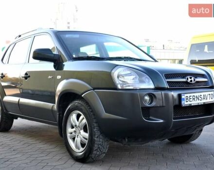 Зеленый Хендай Туксон, объемом двигателя 1.98 л и пробегом 245 тыс. км за 7200 $, фото 6 на Automoto.ua