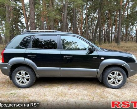 Зеленый Хендай Туксон, объемом двигателя 2 л и пробегом 185 тыс. км за 7950 $, фото 5 на Automoto.ua