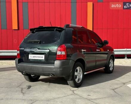 Зеленый Хендай Туксон, объемом двигателя 1.99 л и пробегом 214 тыс. км за 7990 $, фото 7 на Automoto.ua