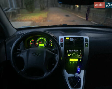 Зеленый Хендай Туксон, объемом двигателя 2 л и пробегом 223 тыс. км за 7950 $, фото 15 на Automoto.ua