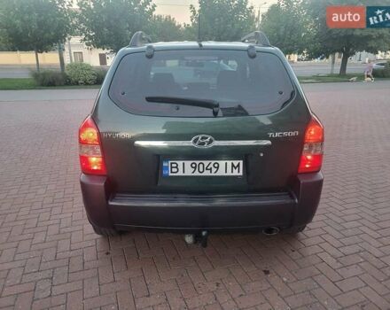 Зеленый Хендай Туксон, объемом двигателя 2 л и пробегом 225 тыс. км за 6100 $, фото 5 на Automoto.ua
