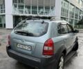 Зеленый Хендай Туксон, объемом двигателя 2 л и пробегом 190 тыс. км за 6150 $, фото 2 на Automoto.ua