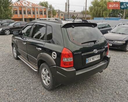 Зеленый Хендай Туксон, объемом двигателя 1.98 л и пробегом 363 тыс. км за 7400 $, фото 13 на Automoto.ua