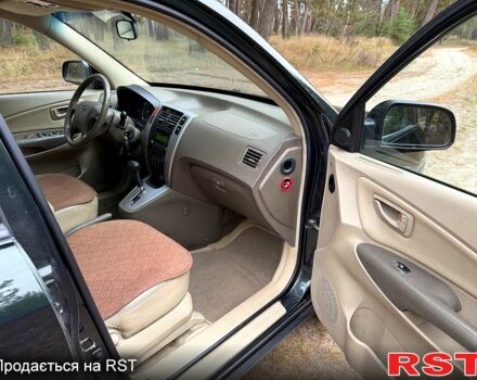 Зеленый Хендай Туксон, объемом двигателя 2 л и пробегом 185 тыс. км за 7950 $, фото 9 на Automoto.ua