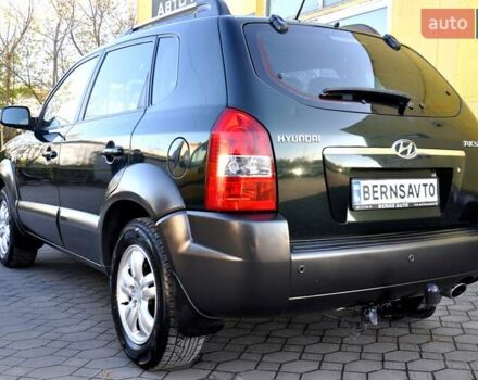 Зеленый Хендай Туксон, объемом двигателя 1.98 л и пробегом 245 тыс. км за 7200 $, фото 12 на Automoto.ua