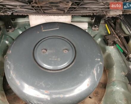 Зеленый Хендай Туксон, объемом двигателя 1.98 л и пробегом 363 тыс. км за 7400 $, фото 40 на Automoto.ua