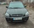 Зеленый Хендай Туксон, объемом двигателя 2 л и пробегом 213 тыс. км за 6500 $, фото 1 на Automoto.ua