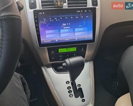 Зеленый Хендай Туксон, объемом двигателя 1.98 л и пробегом 280 тыс. км за 7200 $, фото 20 на Automoto.ua