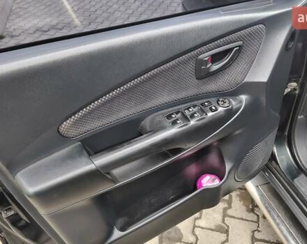 Зелений Хендай Туксон, об'ємом двигуна 1.98 л та пробігом 245 тис. км за 7800 $, фото 27 на Automoto.ua