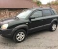 Зеленый Хендай Туксон, объемом двигателя 2 л и пробегом 223 тыс. км за 8500 $, фото 1 на Automoto.ua