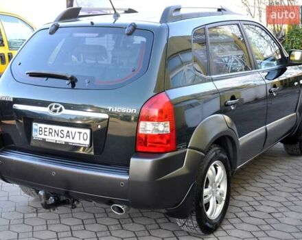 Зеленый Хендай Туксон, объемом двигателя 1.98 л и пробегом 245 тыс. км за 7200 $, фото 7 на Automoto.ua