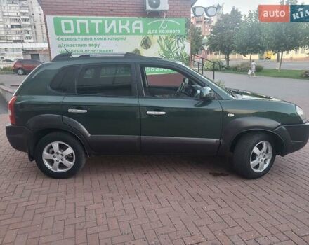Зеленый Хендай Туксон, объемом двигателя 2 л и пробегом 225 тыс. км за 6100 $, фото 7 на Automoto.ua
