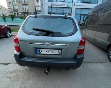 Зеленый Хендай Туксон, объемом двигателя 1.98 л и пробегом 205 тыс. км за 7700 $, фото 1 на Automoto.ua