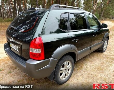 Зеленый Хендай Туксон, объемом двигателя 2 л и пробегом 185 тыс. км за 7950 $, фото 3 на Automoto.ua