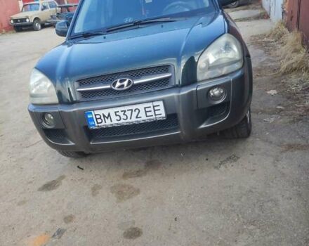 Зелений Хендай Туксон, об'ємом двигуна 1.98 л та пробігом 189 тис. км за 8500 $, фото 3 на Automoto.ua