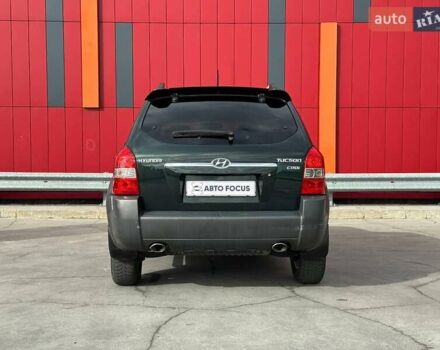 Зеленый Хендай Туксон, объемом двигателя 1.99 л и пробегом 214 тыс. км за 7990 $, фото 6 на Automoto.ua