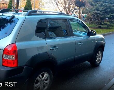 Зелений Хендай Туксон, об'ємом двигуна 2 л та пробігом 227 тис. км за 7800 $, фото 4 на Automoto.ua