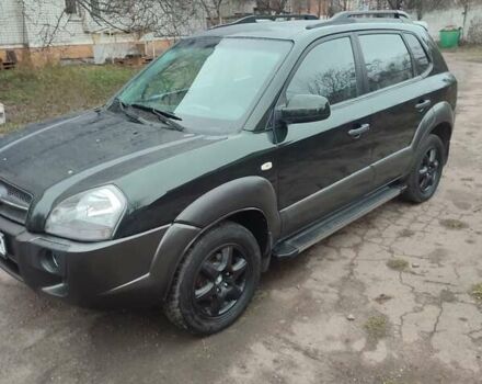 Зеленый Хендай Туксон, объемом двигателя 2 л и пробегом 213 тыс. км за 6500 $, фото 8 на Automoto.ua