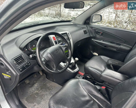 Зелений Хендай Туксон, об'ємом двигуна 2 л та пробігом 248 тис. км за 6999 $, фото 17 на Automoto.ua