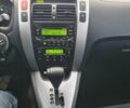 Зелений Хендай Туксон, об'ємом двигуна 2 л та пробігом 149 тис. км за 9900 $, фото 7 на Automoto.ua