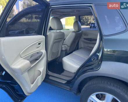 Зеленый Хендай Туксон, объемом двигателя 1.98 л и пробегом 195 тыс. км за 8000 $, фото 12 на Automoto.ua