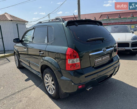 Зелений Хендай Туксон, об'ємом двигуна 2.66 л та пробігом 312 тис. км за 4990 $, фото 10 на Automoto.ua