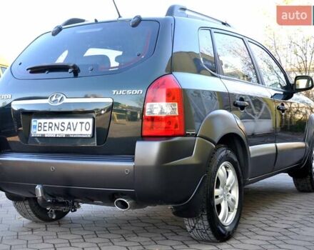 Зеленый Хендай Туксон, объемом двигателя 1.98 л и пробегом 245 тыс. км за 7200 $, фото 8 на Automoto.ua