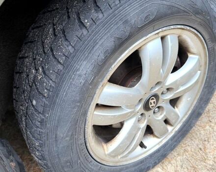 Зеленый Хендай Туксон, объемом двигателя 2 л и пробегом 185 тыс. км за 7950 $, фото 12 на Automoto.ua