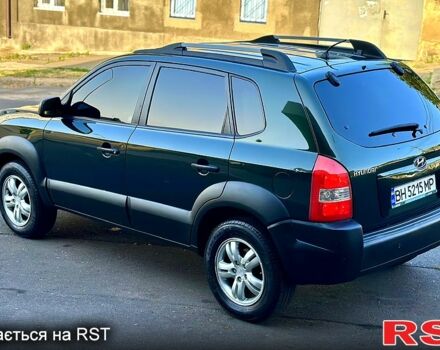 Зеленый Хендай Туксон, объемом двигателя 2 л и пробегом 172 тыс. км за 7000 $, фото 1 на Automoto.ua