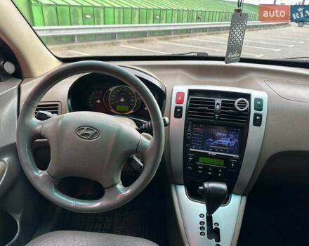 Зеленый Хендай Туксон, объемом двигателя 1.99 л и пробегом 214 тыс. км за 7990 $, фото 13 на Automoto.ua