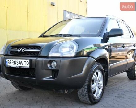 Зеленый Хендай Туксон, объемом двигателя 1.98 л и пробегом 245 тыс. км за 7200 $, фото 2 на Automoto.ua