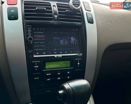 Зеленый Хендай Туксон, объемом двигателя 1.99 л и пробегом 214 тыс. км за 7290 $, фото 22 на Automoto.ua