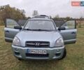 Зеленый Хендай Туксон, объемом двигателя 1.98 л и пробегом 129 тыс. км за 9200 $, фото 5 на Automoto.ua