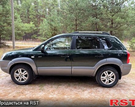 Зеленый Хендай Туксон, объемом двигателя 2 л и пробегом 185 тыс. км за 7950 $, фото 4 на Automoto.ua
