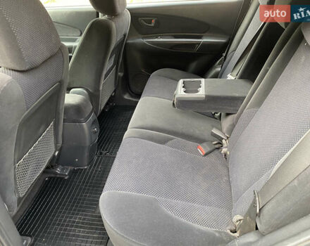 Зелений Хендай Туксон, об'ємом двигуна 2 л та пробігом 300 тис. км за 5850 $, фото 13 на Automoto.ua