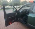 Зеленый Хендай Туксон, объемом двигателя 2 л и пробегом 225 тыс. км за 6100 $, фото 8 на Automoto.ua